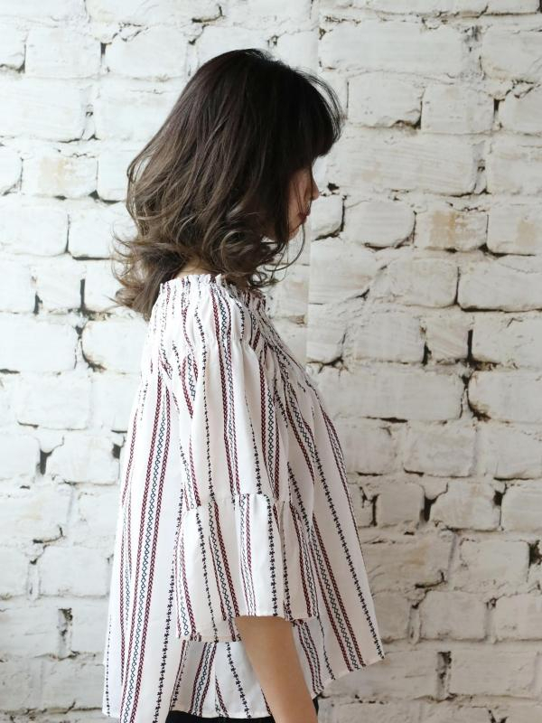 上品でクールな印象のミディアムパーマスタイル