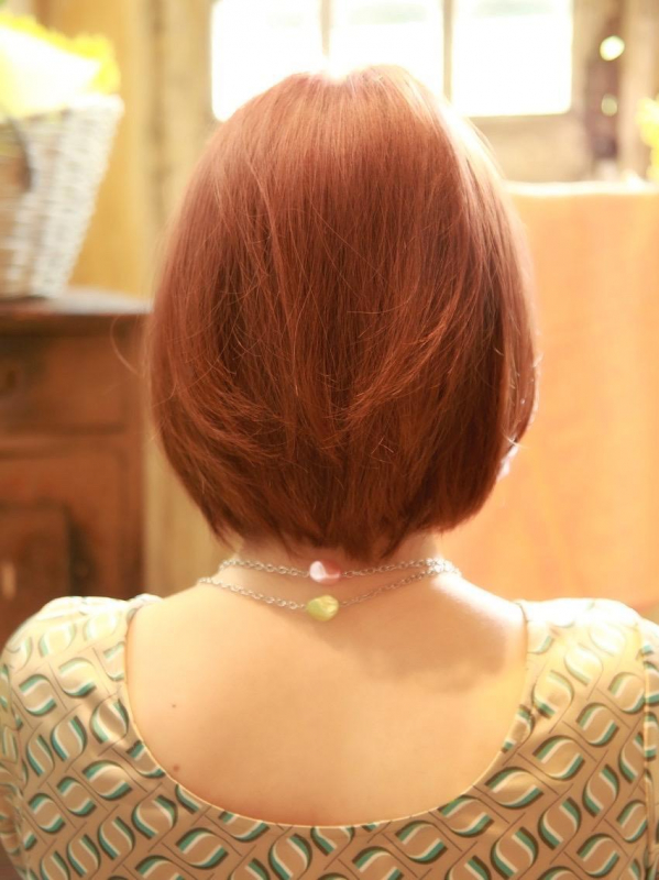 オレンジブラウンと小顔効果のあるセクシーなボブヘア